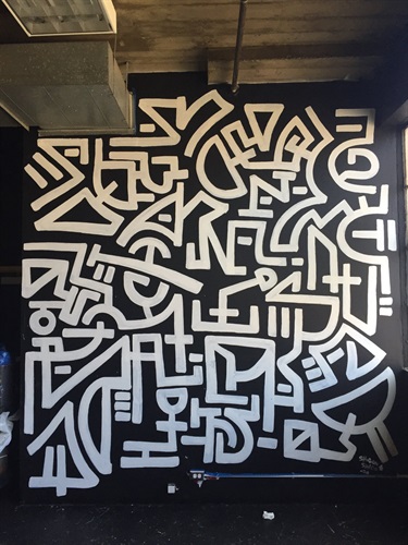 A mural painted on the wall. 