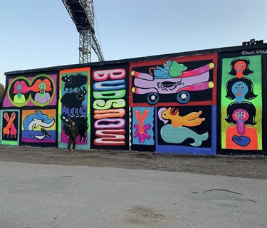 A mural painted on a building wall.