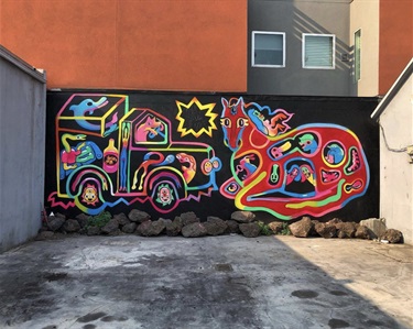 A mural painted on a building wall.