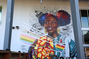 A mural painted on a building wall. 