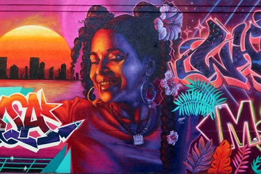 A mural painted on a building wall. 