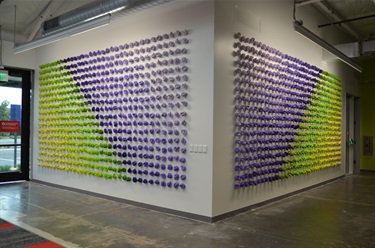 An abstract art installation on a wall. 