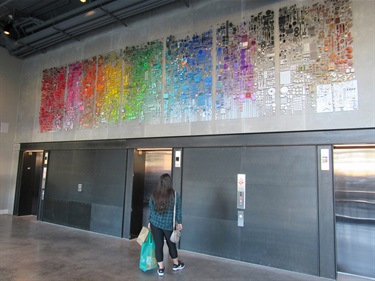 An abstract art installation on a wall. 