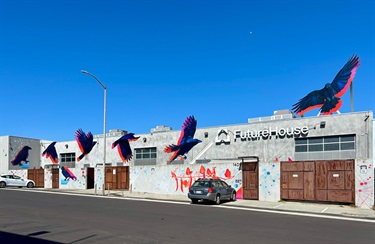 A mural painted on a building wall. 