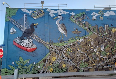 A mural painted on a building wall. 