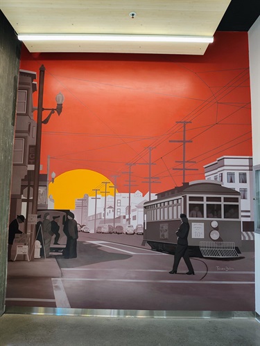 A mural painted on a building wall. 