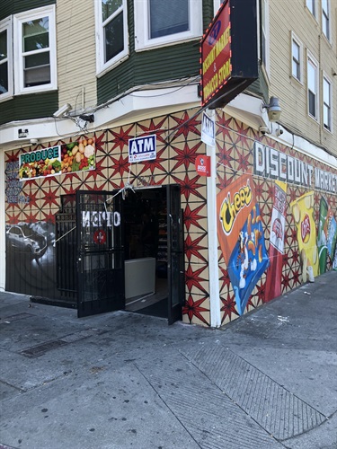 A mural painted on the side of a building. 