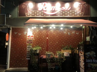 A mural painted on the side of a building. 