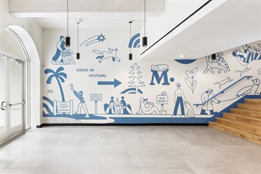 A mural painting on a building wall. 