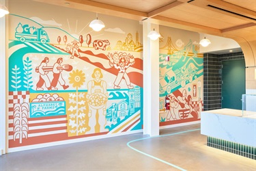 A mural painting on a building wall. 