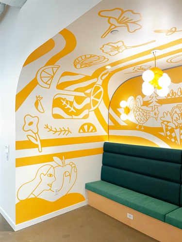 A mural painting on a building wall. 