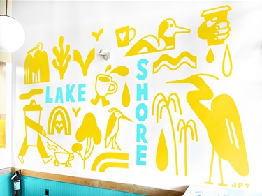 A mural painting on a building wall. 