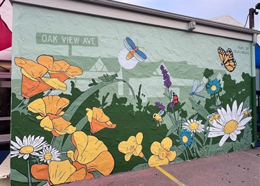 A mural painted on a building wall. 