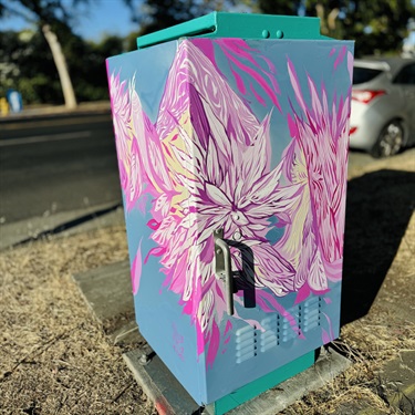 A painted utility box. 