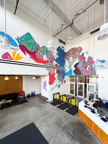 A mural painted on a building wall. 