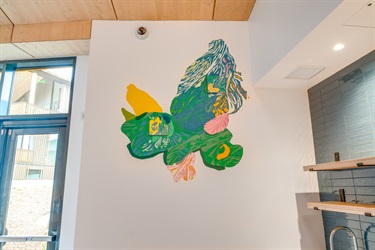 A mural painted on a building wall. 