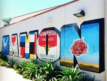 A mural painted on a building wall. 