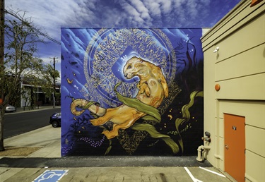 A mural painted on the wall of a building. 