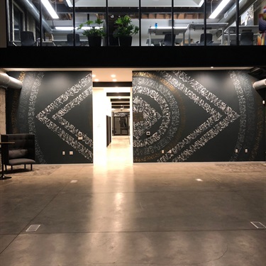 A mural painted on the wall of a building. 