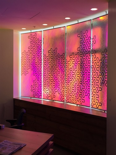 An illuminated abstract artwork. 