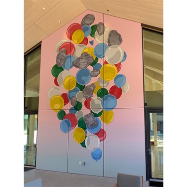 A mural painted on the wall of a building. 