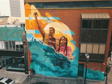 A mural painted on the wall of a building.