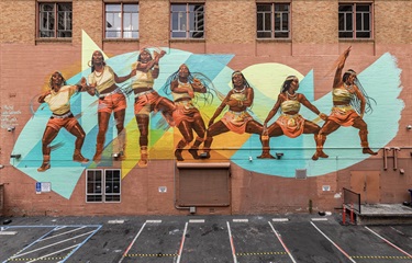 A mural painted on the wall of a building.