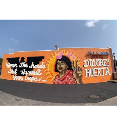 A mural painted on a building wall. 