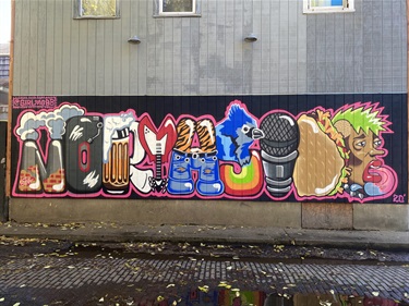 A mural painted on a building wall. 