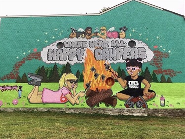 A mural painted on a building wall. 