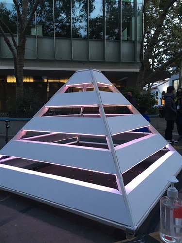 An illuminated abstract sculpture.