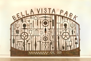 A steel gate incorporating found objects in a studio prior to installation.