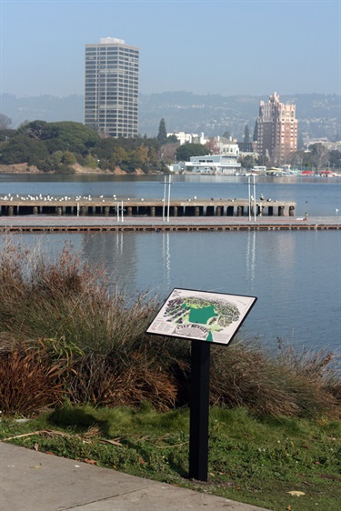A podium with a sign installed at Lake Merritt.