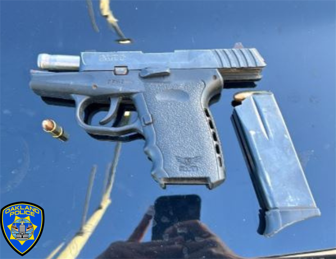 Photo of a firearm that was recovered. Also a bullet, the gun magazine and OPD logo