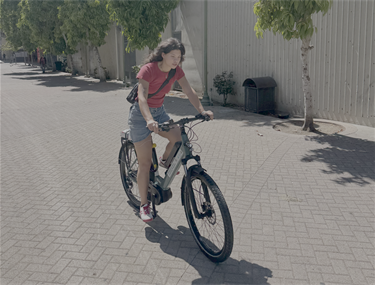 Woman riding bike