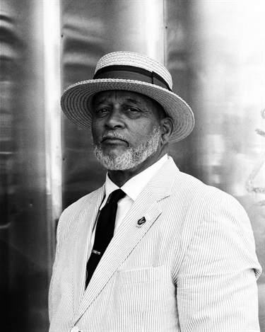 A portrait of a person looking at the camera. 