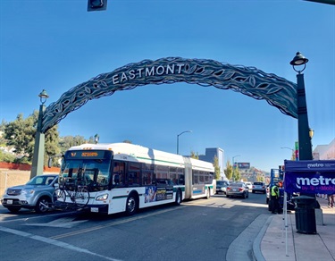 An arched metal gateway with the words 